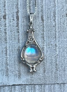 "Vintage Moonstone Pendant/Sterling Silver/June Birthstone/Free Shipping/Gift For Her/Rainbow Moon Stone/Women's Jewelry/Antique Style Gifts ** These Vintage Style Moonstone Pendants are Handmade to Order. The processing time for these pieces is 1 week ** This gorgeous pendant has the look of an Antique piece but is absolutely brand new and Handcrafted with Love! Made of Solid .925 Sterling Silver, you can be assured you are receiving a high quality piece of jewelry. It features four prongs, whi Rainbow Moonstone Necklace, Jewelry Antique, June Birthstone, Moonstone Necklace, Moonstone Jewelry, Moonstone Pendant, Fantasy Jewelry, Girly Jewelry, June Birth Stone