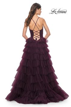 La Femme 32086 Ruffle tiered a-line ball gown with a unique ruched bodice and lace up back. Back zipper closure. Formal Ball Gown With Sweetheart Neckline And Ruffles, Formal Ball Gown With Ruffles And Sweetheart Neckline, Ruffled Evening Dress For Prom Season And Quinceanera, Wedding Dress With Ruched Bodice And Ruffled Straps, Tiered Tulle Gown For Formal Occasions, Formal Tiered Tulle Gown, Quinceanera Evening Dress With Ruffles For Prom Season, Fitted Ruffle Evening Dress For Quinceanera, Tiered Ruffle Gown For Prom Season