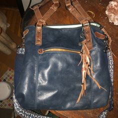 Navy Leather With Fringe Detail. Font Zip Pocket, Shoulder And Crossbody Straps, Back Cell Phone Pocket. Blue Liner With A Zip Pocket And Two Open Small Pockets 14” Tall, 14” Wide And 4.5” Deep At The Bottom Sak Purses, Bucket Tote Bag, Blue Liner, Knit Purse, Soft Leather Tote, Brown Leather Satchel, Boho Tote, Crochet Tote Bag, Woven Tote Bag