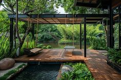 an outdoor area with wooden decking and water features