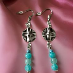 Women's | Girls,  Silver  boho hoop Earrings with Stone Seed Beed drops.    These simple designs are sure to capture an admirer and makes a fantastic gift. The  turqoise blue stacked Seed Beads create the uniqueness in this set. approx length  3 1/2"Long Bohemian Blue Beaded Earrings With Silver Beads, Turquoise Dangle Beaded Earrings With Tiny Beads, Blue Bohemian Beaded Sterling Silver Earrings, Bohemian Light Blue Dangling Bead Earrings, Turquoise Metal Beaded Bohemian Earrings, Diy Pumpkins Crafts, Small Dangle Earrings, Boho Hoop Earrings, Bohemian Earrings