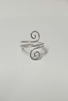 Solid .925 Sterling Silver Swirl Ring Hammered textured statement ring. Silver Spiral Wire Wrapped Rings, Silver Spiral Midi Rings As Gift, Nickel-free Spiral Silver Rings, Hand Forged Silver Swirl Jewelry, Handmade Swirl Jewelry With A Modern Twist, Adjustable Spiral Midi Rings In Silver, Adjustable Spiral Silver Midi Rings, Adjustable Silver Spiral Midi Rings, Adjustable Nickel-free Swirl Jewelry