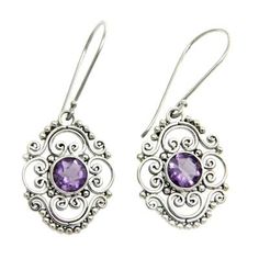 Amethysts the February??s birthstone center ornate mosaics of Indonesian elegance in earrings by Buana. He crafts the earrings by hand with sterling silver and 3 gemstone carats. .925 Sterling silver Ornate Purple Jewelry With Matching Earrings, Ornate Purple Dangle Earrings, Ornate Purple Drop Earrings, Purple Earrings With Intricate Design As Gift, Purple Earrings With Intricate Design For Gift, Ornate Purple Pierced Earrings, Ornate Purple Dangle Jewelry, Ornate Purple Sterling Silver Earrings, Ornate Gemstone Dangle Earrings