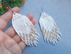 Dangle earrings White gold fringe earring Seed bead earrings Wedding earrings Statement fringe earrings Handmade jewelry gift Materials: Czech beads, stainless steel ear hook Size: length - 8 cm (3 1/4 inches ), width 3,5 cm (1 3/8 inches ) The color of the live product may differ from the photo depending on the brightness settings of your monitor. Earrings can be made in another color, write to me if you need to change something. You can see these and other works on my Instagram page: mila_kim_handmade Boho Wedding Jewelry, Fringe Earring, Gold Ombre, Ombre Earrings, Earrings White Gold, Gold Fringe, Women Earrings, Handmade Jewelry Gift, Earrings Women