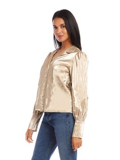 Exude confidence and charisma as you shimmer in the light creating a radiant and luxurious look with this beautiful top. Crushed Metallic: 50% Polyurethane 35% Viscose 7% Acrylic 8% Metallic/Cotton Made in USA Hand wash with cold water. Hang to dry Length: 23 inches (size S) Notched collar Button up Shell buttons Style number: 4F19046 Long Sleeve Button Up Shirt, Gold Dust, Shell Buttons, Notched Collar, Button Up Shirt, Made In Usa, Button Up, Long Sleeve, Gold