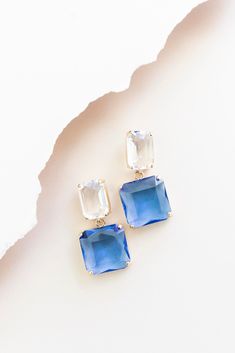 Add the perfect touch of sparkle to your look with our Clarice drop earrings! Royal blue square cut crystals dangle from clear rectangle cut crystal accents anchored with comfortable post back closures. Take your look from day to night with sophistication for any occasion! Short crystal drop earrings Blue & clear crystals Post backs Bright Blue Earrings, Bridal Party Earrings, Blue Bridal Earrings, Blue Drop Earrings, Wedding Earrings Drop, Gem Earrings, Wedding 2024, Blue Bridal, Party Earrings