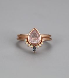 Rose Gold Sapphire Ring For Wedding, Dainty Pink Stackable Rings For Wedding, Stackable Teardrop Jewelry For Wedding, Stackable Teardrop Wedding Jewelry, Rose Gold Teardrop Jewelry For Proposal, Pink Stackable Wedding Rings Fine Jewelry, Pink Stackable Wedding Rings In Fine Jewelry Style, Pink Stackable Wedding Rings, Pink Gemstone Stackable Rings For Wedding