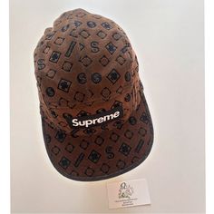 Supreme Hat Brown Brand New Brown 5-panel Hat For Streetwear, Brown Short Brim Baseball Cap For Streetwear, Brown Snapback Hat With Short Brim For Streetwear, Brown Hat With Logo Patch For Streetwear, Brown Streetwear Hats With Logo Patch, Supreme Hat, Supreme Accessories, Flocking, Accessories Hats