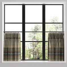 an open window with curtains in front of it and trees out the window behind them