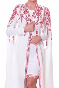 White Embroidered Dress With Cape Sleeves, White Traditional Dress With Cape Sleeves, White Dresses With Cape Sleeves, White Resham Embroidery Kaftan For Wedding, Embroidered Cape Dress, Traditional White Dress With Geometric Embroidery, Long White Dress With Intricate Embroidery, White Long Dress With Intricate Embroidery, White Long Sleeve Dresses With Geometric Embroidery