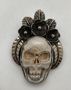 This beautiful skull pendant was handcrafted in Nepal with Tibetan silver. The pendant is set with floral design tibetan silver. The measurement of pendant is approximately 45mmX60mm and it weighs about 26 gm Tibetan Jewelry, Skull Carving, Skull Pendant, Tibet, Nepal, Jewelry Necklace Pendant, Floral Design, Jewelry Necklaces, Carving