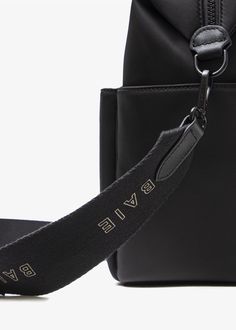 Let’s just say you’ll be looking for reasons to leave the house with the BAIE Strap. With its smooth Nappa leather details and edgy design, this long adjustable strap goes with just about everything, giving your everyday diaper bag a whole new look and feel. Changing Pad, Black Hardware, Monogrammed Items, Black Friday Sale, Nappa Leather, Leather Trims, Adjustable Straps, Black Silver, Diaper Bag