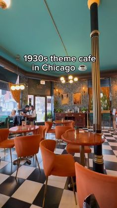 the inside of a restaurant with orange chairs and black and white checkered flooring