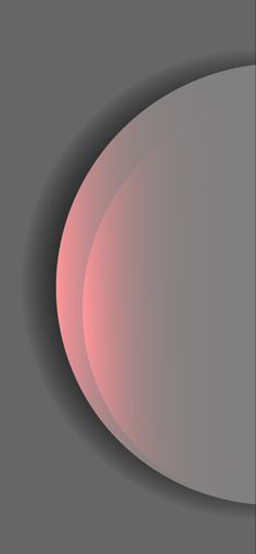 an oval shaped object is shown in pink and grey colors, with the light reflecting on it's surface