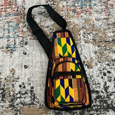 Made In Ghana Only One Available Yellow Bag With Adjustable Strap For Everyday, Multicolor Portable Bag For Travel, Yellow Canvas Shoulder Bag For Travel, Multicolor Portable Shoulder Bag For Travel, Travel Multicolor Mobile Phone Bag, Multicolor Portable Backpack For Everyday Use, Portable Multicolor Shoulder Bag For Travel, Portable Multicolor Backpack For Everyday Use, Mustard Crossbody Shoulder Bag For Travel