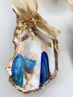 an ornament with two blue birds on it