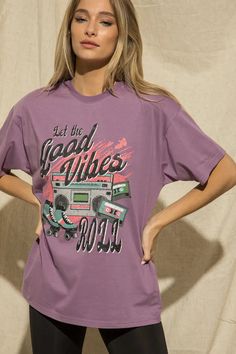 Make a statement with this Let The Good Vibes Roll Tee! Featuring a distressed detail and oversized fit, this purple t-shirt will have 'em rolling in good vibes. Don't be shy - time to get out there and show off your great style! 🤩 How To Style: Dressed Down: Wear it with your favorite shorts and sneakers for a fun on-the-go look! Dressed Up: Size up and wear it as a dress, paired with cowgirl boots and a jean jacket or blazer for a fun night-out look! How It Fits: Unisex relaxed fit. Recommend Retro Purple T-shirt With Graphic Print, Oversized Purple T-shirt With Letter Print, Purple Grunge T-shirt With Letter Print, 90s Style Purple T-shirt With Letter Print, Purple 90s Style T-shirt With Letter Print, 90s Purple T-shirt With Letter Print, Retro Purple Tops For Streetwear, 90s Purple Top With Graphic Print, 90s Style Purple Top With Graphic Print