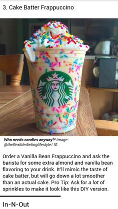 the starbucks cup is decorated with sprinkles