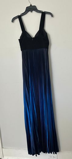 A gorgeous vintage satin evening gown by Betsy and Adam. This dress is a perfect piece of the 2000s brought to you! This dress is in wonderful shape will no stains or tears. This dress fits like a modern 4. As with all of our items this dress is not thrifted and it is locally sourced. Ombre Maxi Dress, Satin Evening Gown, Cocktail Gowns, Maxi Robes, Pleated Dress, Evening Gowns, Satin, Art Collection, Dress Outfits