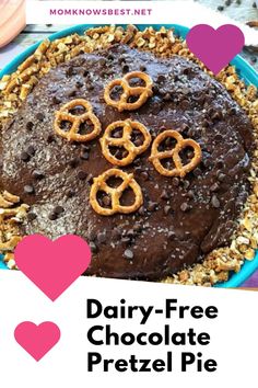 a chocolate pie with pretzels on top and the words dairy - free chocolate pretzel pie above it