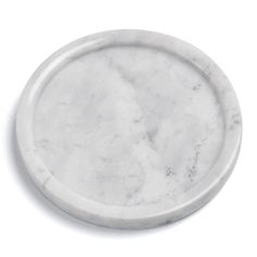 a white marble plate on a white background