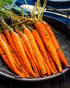 there are carrots that have been cooked in the pan