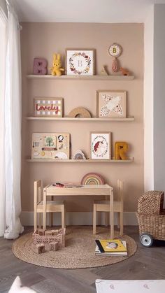 a child's playroom with toys and books on the shelves in front of it