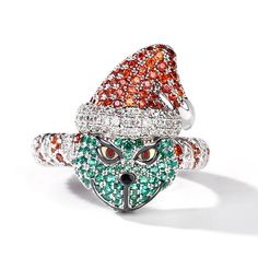 Do you still remember a green monster in that Christmas fantasy comedy film? Inspired by this film, this ring features a vivid monster with a green face and red Christmas hat. Beautifully handcrafted in sterling silver, it shimmers with sparkling stones, bright eyes and radiant smile. You will instantly fall in love with this cute design.Width: 21.1 mmHeight: 7.9 mmThickness: 4.5 mmMaterial: 925 SilverPlating Color: Silver, Black Novelty Red Christmas Jewelry, Red Novelty Christmas Jewelry, Red Novelty Jewelry For Christmas, Red Christmas Novelty Jewelry, Christmas Novelty Silver Jewelry, Monster Christmas, Christmas Ring, Comedy Film, Fashion Edgy