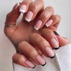 From classic elegant nails to bold wedding nails, these classy wedding nail designs will have your fingertips ready to say 'I do' in style! Looking for wedding nails? We have what you need! Check out our wedding nail inspo for wedding nails and wedding nail designs here! 💅 Two hands with nude wedding nails, one hand has white french tips and the other has black french tips Acrylic Black And White Nails, Black And White Nails Aesthetic, Nails Short Black And White, Black And White Nails Simple, Nails Ideas Black And White, Nails Acrylic Black And White, Nails Design Black And White, Short Black And White Nails, Simple Black And White Nails