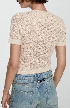 Crochet-style stitching creates an airy scalloped pattern in a short-sleeve sweater fashioned in a slightly cropped, contemporary length. Mock neck Short sleeves Semisheer 67% cotton, 33% polyester Hand wash, line dry Imported Summer Crochet Top With Pointelle Knit And Short Sleeves, Spring Knit Tops With Scalloped Edges, Short Sleeve Crochet Knit Top, Open Knit Short Sleeve Top, Casual Crochet Top With Open Knit And Short Sleeves, Casual Crochet Top With Short Sleeves, Short Sleeve Knit Tops With Crochet Lace, Casual Crochet Top With Pointelle Knit Short Sleeves, Short Sleeve Crochet Lace Knit Top