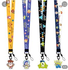 three lanyards with cartoon characters on them