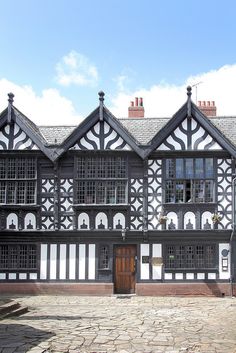 an old building with black and white architecture