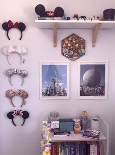 the wall is decorated with mickey mouse ears and other items on it's shelves