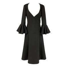 MARC JACOBS Fall-Winter 2019 dress comes in a black wool blend featuring a deep v-neck, a-line style, ruffled sleeves, and a back zipper closure. Seen on Gigi Hadid. Made in USA. Excellent Pre-Owned Condition. Marked: 2 Measurements: Bust: 34 inches Waist: 26 inches Hip: 40 inches Sleeve: 21 inches Length: 48 inches Reference: 113586 Category: Dress More Details Brand: MARC JACOBS Size: 2 Color: Black Fabric: Wool Blend Pattern: Solid Style: A-Line Age Group: Adult Gender: Female Chic Fitted V-neck Dress For Winter, Elegant Winter V-neck Dress, Chic V-neck Evening Dress For Fall, Ruffled Midi Dress For Winter Evening, Ruffled Midi Dress For Evening In Winter, Fitted Black V-neck Dress For Fall, Elegant Midi Length V-neck Winter Dress, Elegant Winter V-neck Midi Dress, Elegant Midi Length V-neck Dress For Winter