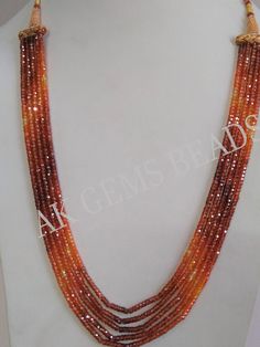 PRODUCT DETAILS: AAA Orange Shaded Cubic Zirconia 5 Strand Faceted Rondelle Beaded Necklace Jewelry Stone Name :- Cubic Zirconia ( Light Orange, Dark Orange ) Bead Size :- 3mm Length :- 13 to 15 Inches Bead Shape :- Rondelle Bead Type :- Faceted Quality :- AAA (Excellent) Treatment :- Natural 2. NECKLACE LENGTHS :- 1st Strands :- 13 Inches 2nd Strands :- 13.5 Inches 3rd Strands :- 14 Inches 4th Strands :- 14.5 inches 5th Strands :- 15 inches More Fine Shop Gemstones Gemstone Cubic Zirconia Neckl Necklaces For Girls, Faceted Bead Necklace, Gemstone Beads Wholesale, 2 Necklace, Zircon Necklace, Gemstone Beads Jewelry, Artificial Jewellery, Semi Precious Jewelry, Gemstone Beaded Necklace