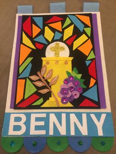 an art project made out of paper with the word jenny on it