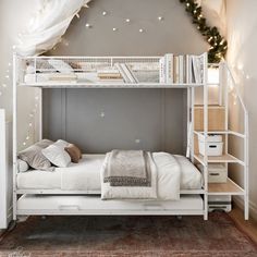 a white bunk bed sitting under a christmas tree