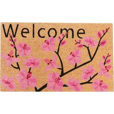 a welcome mat with pink flowers on it