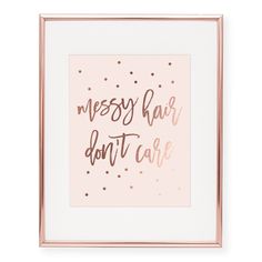 a pink and gold framed art print with the words messy hair don't care