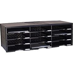 a large black storage unit with many compartments