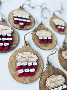 wooden christmas ornament with red and white ornaments