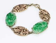 Carved Jade & Gold Bracelet.Vintage 14K yellow gold carved jade bracelet measures 7 inches, designed by Newark jeweler Walter Lampl circa 1930. This beautiful jade bracelet from the Art Deco era is a wonderful example of Walter Lampl's work! This artistic piece is comprised of carved jade plaques that alternate with carved gold ducks and flower motif forming a lovely link bracelet. Founded in 1921, The Walter Lampl Company NY designed particularly intricate carvings and often whimsical jewel Collectible Art Deco Carved Jewelry, Art Deco Carved Collectible Jewelry, Heirloom Jade Jewelry For Formal Occasions, Antique Carved Bracelets, Art Deco Jade Jewelry For Formal Occasions, Formal Art Deco Jade Jewelry, Collectible Yellow Gold Jade Jewelry, Vintage Carved Jade Jewelry, Vintage Carved Jewelry Bracelet