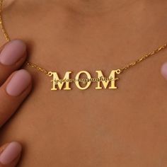 Mom Necklace,Solid Gold Nameplate Necklace,Necklace For Mothers Day,10k 14k 18k Real Gold Mom Necklace For Christmas,Necklace For Women This necklace is handmade and produced with 10k 14k 18k solid gold according to your preference. Our gold color options: Yellow Gold,White Gold, Rose Gold Pendant Sizes: height: 0.35 inches (9mm) width: 1.38 inches (35mm) We have 3 Types solid gold chain options: Type1 Chain (0.85mm thick) Type2 Chain (0.97mm thick) Type3 Chain (1.30mm thick) We use lobster claps on our chains. Chain length: 14 inches adjustable 13 inches 16 inches adjustable 15 inches 18 inches adjustable 17 inches 20 inches adjustable 19 inches 22 inches adjustable 21 inches The necklace is made to order. We make it ready for shipment within 3 business days.  Please contact us using the Custom Yellow Gold Nameplate Necklace For Mother's Day, Yellow Gold Custom Nameplate Necklace For Mother's Day, Yellow Gold Name Necklace For Mother's Day Anniversary, Yellow Gold Name Necklace For Anniversary On Mother's Day, Gold Nameplate Necklace For Mom, 14k Gold Necklaces For Mother's Day, Gold Nameplate Necklace As Gift For Mom, Gold Nameplate Jewelry As Gift For Mom, Dainty Engraved Necklace For Mother's Day