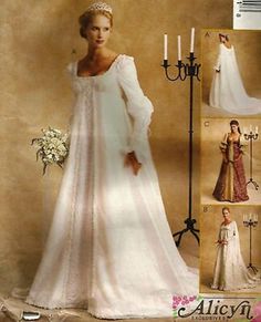 an image of a woman in a wedding dress with long sleeves and cape on it