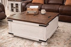 a coffee table with an old typewriter on it