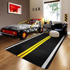 a room with a car bed and black leather chairs in it, along with a large rug on the floor