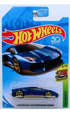 a blue hot wheels car with gold rims