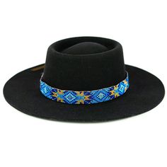 Dress up any hat with this western beaded leather hat band. Beautiful native and Navajo patterns with vibrant colors. Bring a southern charm to your old favorites with this gorgeous hat band or make your new hat even more special. Made of full grain leather (highest grade leather) and glass beads. Handmade in Brazil by artisan women. You can match your hat band with our best-selling leather beaded dog collars! Treated with beeswax, water resistant. 30 days free returns or exchange. 1-year ... Black Bohemian Hat With Flat Crown, Handmade Southwestern Blue Hat Band, Bohemian Black Hat Bands For Ranch, Artisan Fedora With Flat Crown For Festivals, Adjustable Southwestern Blue Hat Band, Southwestern Blue Beaded Hat Band, Adjustable Blue Southwestern Hat Band, Handmade Multicolor Hat Bands For Rodeo, Handmade Southwestern Multicolor Hat Band