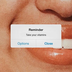 a close up of a person's mouth with the words reminder on it