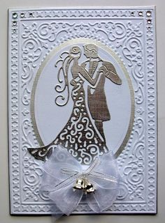 a wedding card with a bride and groom on it